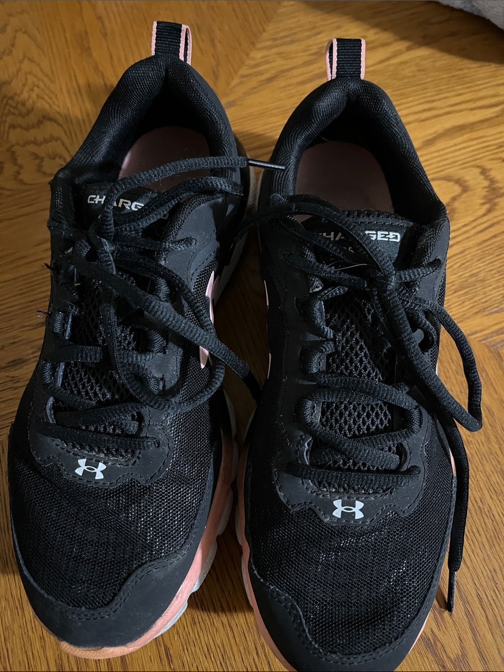 Under Armour Women’s Black with Peach Accent Athletic Sneakers Charged Assert
